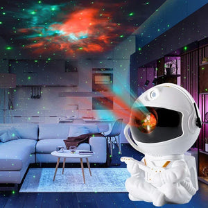Astronauta proyector de galaxias